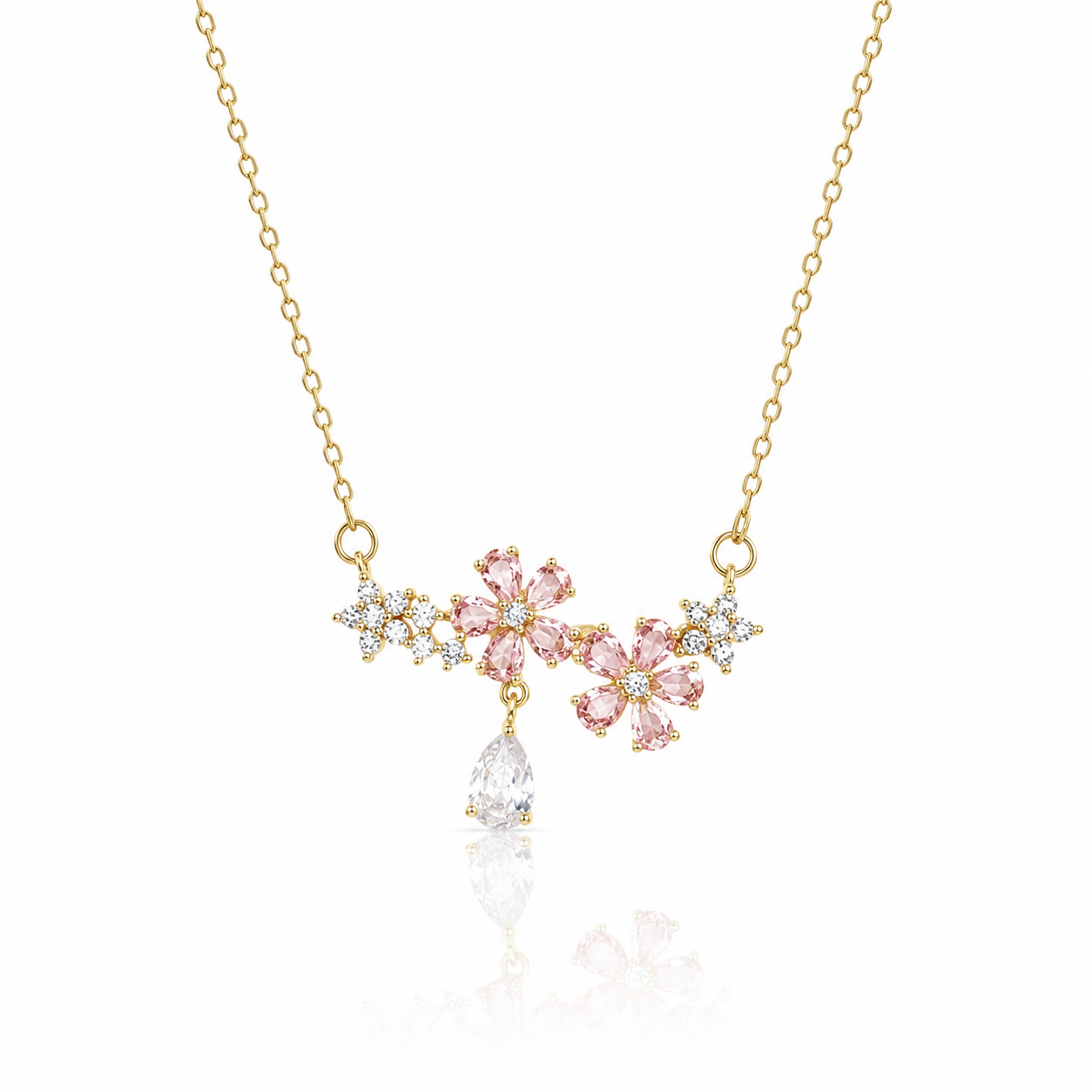 Blossé Necklace in 18K gold plated stainless steel featuring pink flower crystals, sparkling cubic zirconia and a pear-shaped pendant