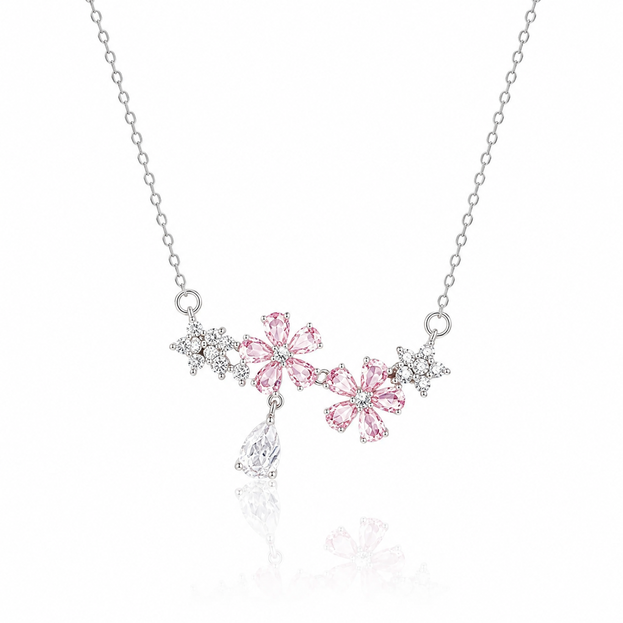 Blossé Necklace in silver stainless steel featuring pink flower crystals, sparkling cubic zirconia and a pear-shaped pendant
