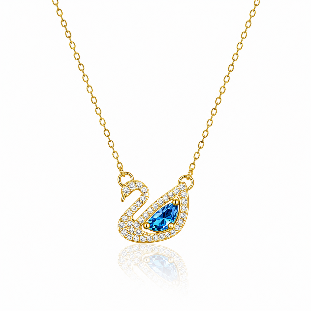 Swané Necklace in 18K gold plated stainless steel featuring a swan pendant with blue marquise crystal and sparkling cubic zirconia