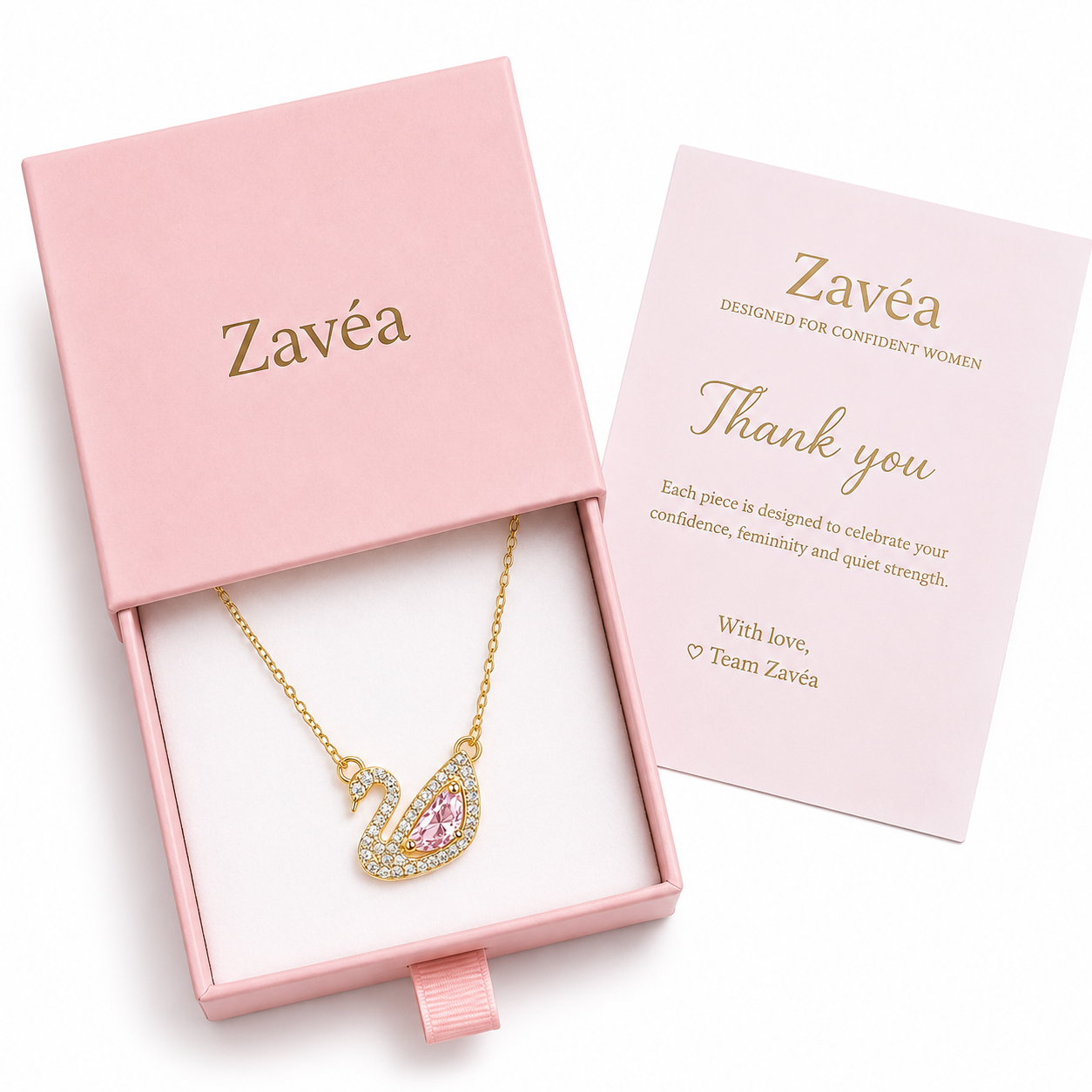 Swané Necklace beautifully presented in a luxury Zavéa Jewellery gift box, featuring a gold swan pendant with pink marquise crystal